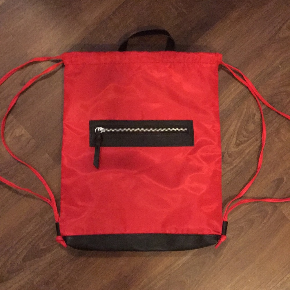 Red and black drawstring backpack